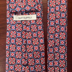 Red and blue Suit Supply tie